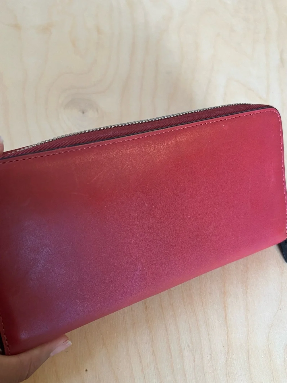 Tumi Red Leather Zip-Around Wallet with Black Trim
